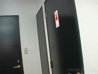 Asian Teen seductress movs Twat While Pissing In A Toilet